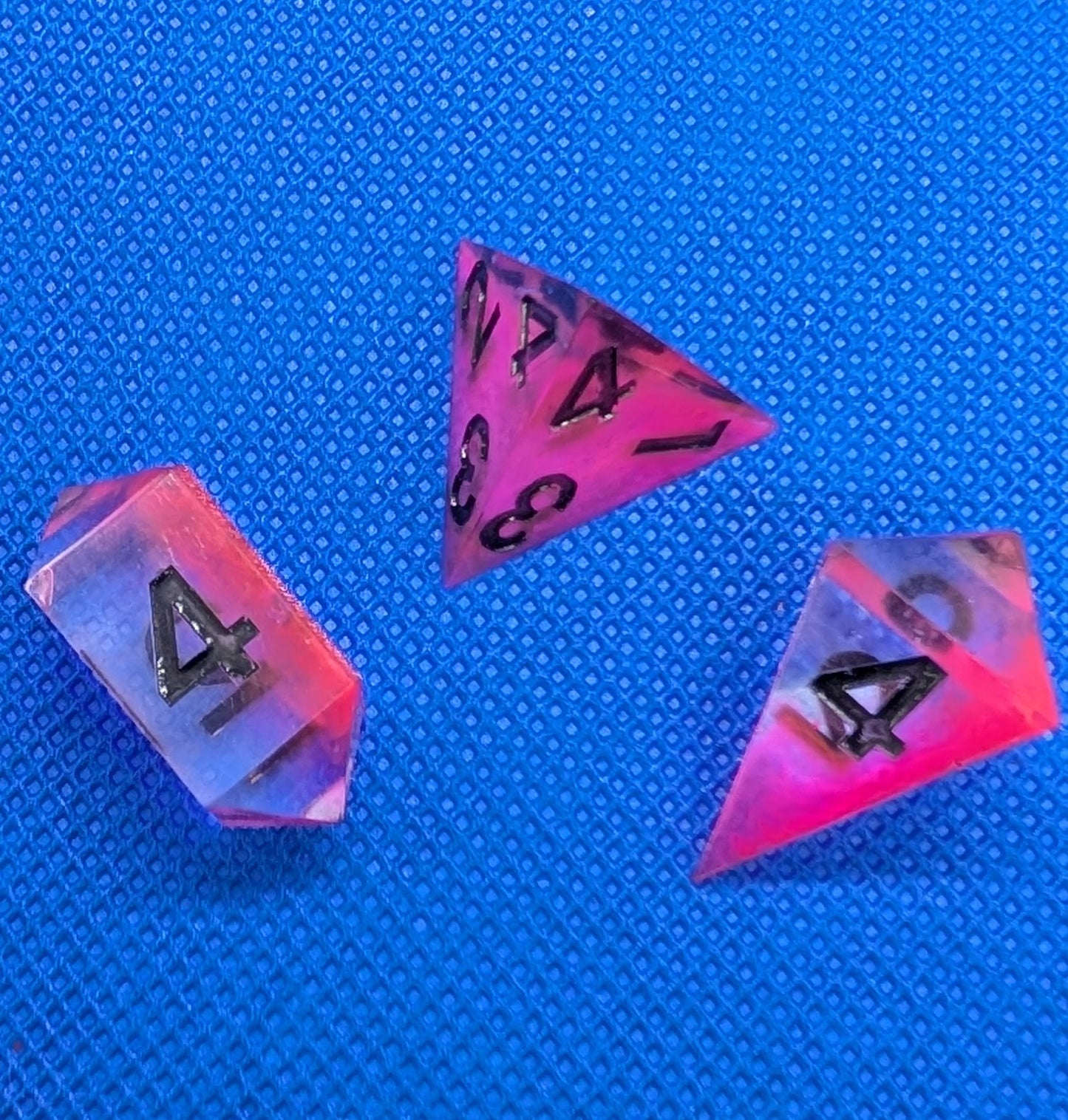 UV Reactive Pink and Clear Polyhedral Dice Set inc. shard d4 and gem d4 with black numbering